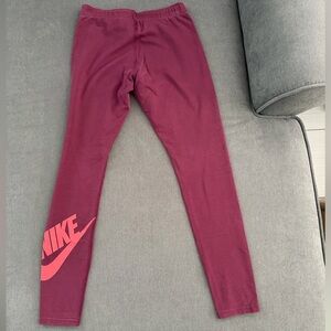 Nike Womens Burgundy Leggings with Corral Logo. Women’s medium